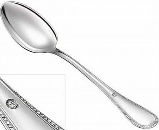 silver spoon set with a diamond 