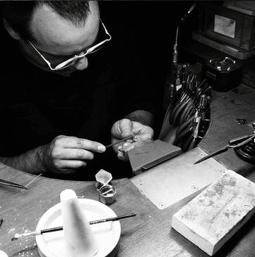 Jewellers hand making fine jewellery